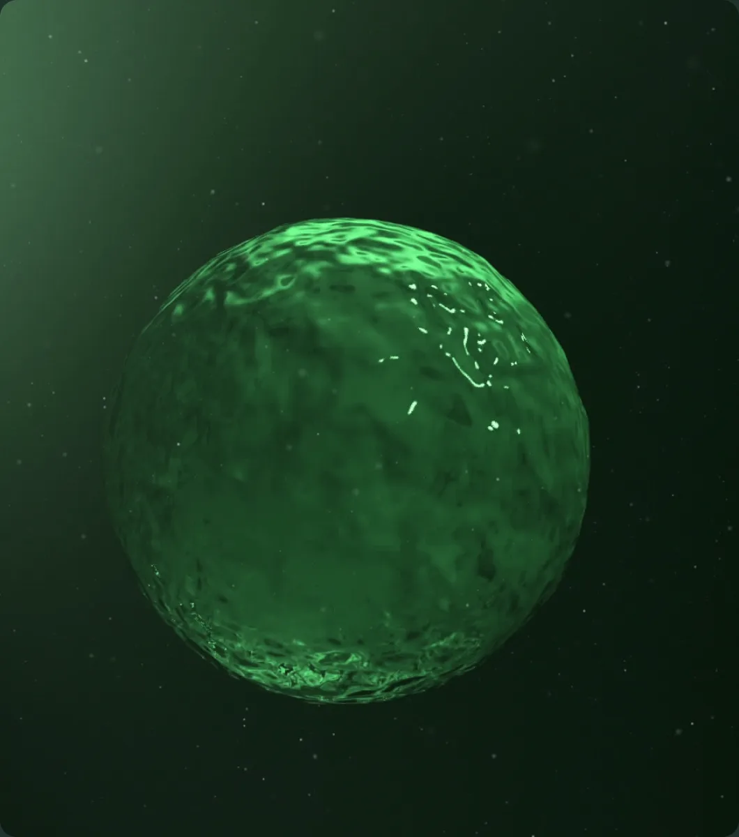 A green organoid glowing in a dark field