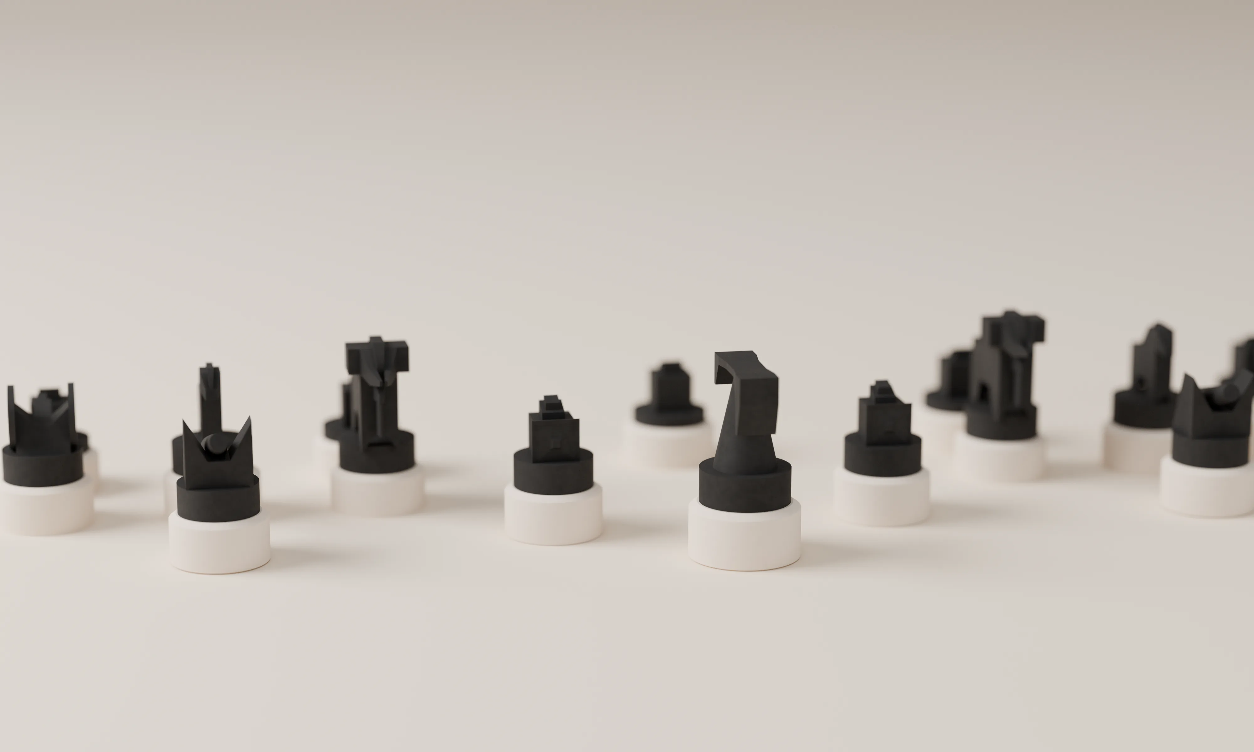 The black XIANGQI pieces on white bases lined up on a plain light surface, each type with its own sculptural silhouette - the chariot, horse, elephant, advisor, general, cannon and soldiers