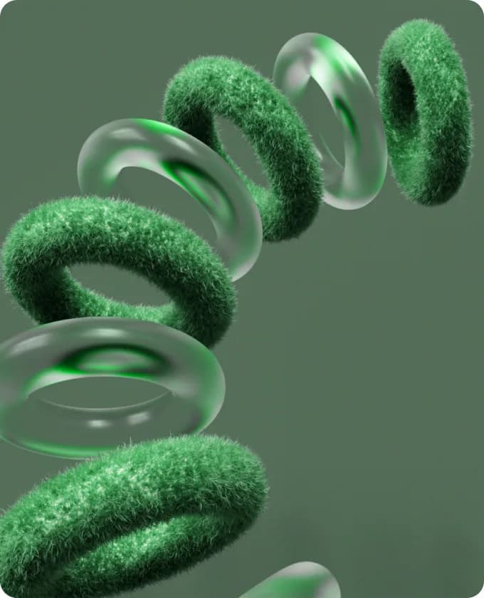 Rings of green-textured glass in a soft green haze